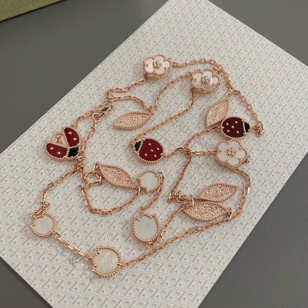 LUCKY SPRING 15 MOTIFS PINK GOLD NECKLACE